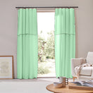 Rideau sur mesure panneau bordé bourdon en lin vert menthe