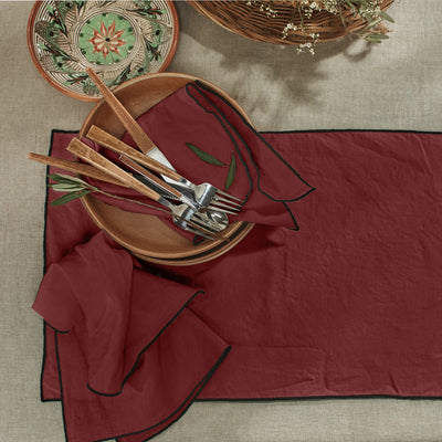 Set de table bordé en lin lavé brique