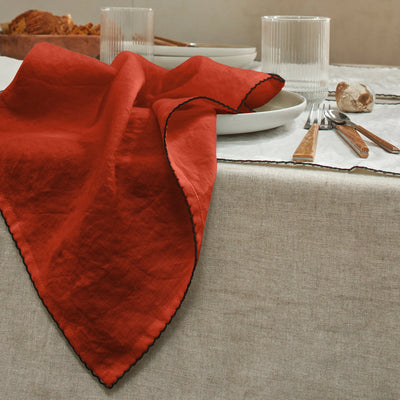 Serviette de table crochetée corail en lin lavé 