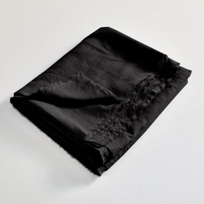 drap plat en lin lavé effrangé plié Encre Noire