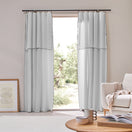 Rideau sur mesure panneau bordé bourdon en lin gris minéral