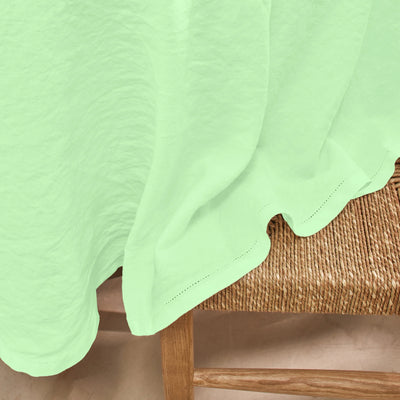 Nappe ovale en lin lavé ajouré sur mesure vert menthe