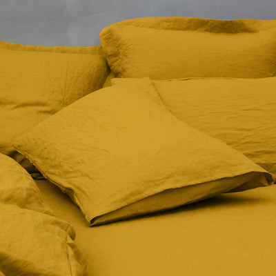 Paire de taies d'oreiller en lin jaune moutarde